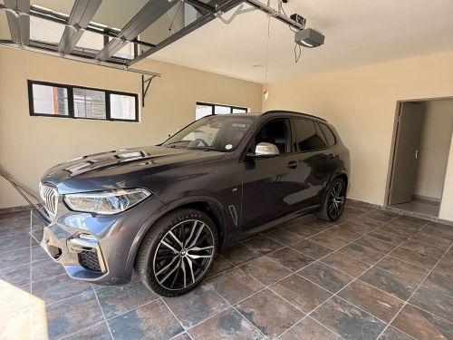 Pre-owned BMW X5 M50i for sale in 
